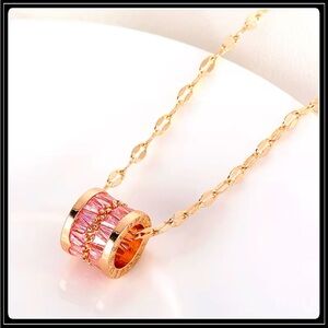 NEW GOLD BAGUETTE SIMULATED PINK AMETHYST "BELOVED" LUCKY WHEEL NECKLACE